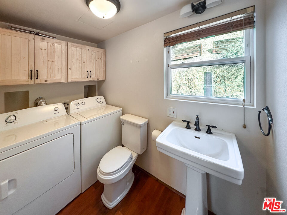 2445 Burson Road Topanga, CA 90290 - Photo 6 of 14 a bathroom with a sink toilet and a window