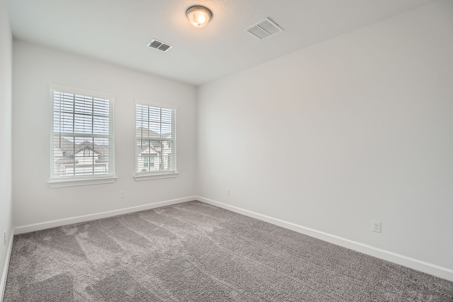 582 Wild Pecan Loop Buda, TX 78610 - Photo 20 of 28 Unfurnished room with baseboards and carpet