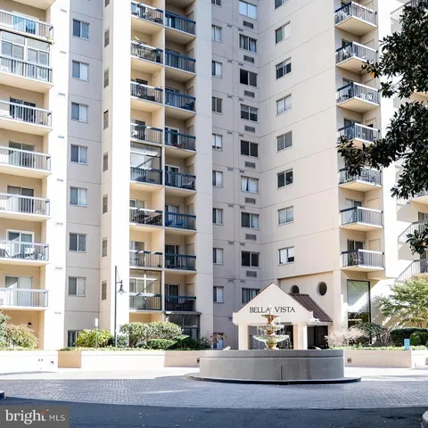 a view of a building with a street