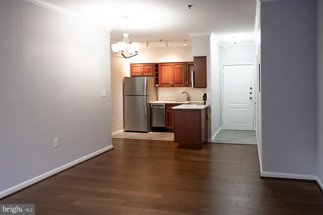 a view of kitchen with wooden floor