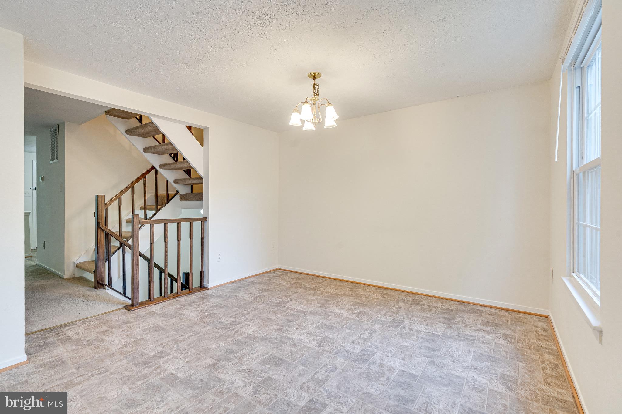 6518 Alexis Lane Springfield, VA 22152 - Photo 11 of 44 a view of a livingroom with stairs
