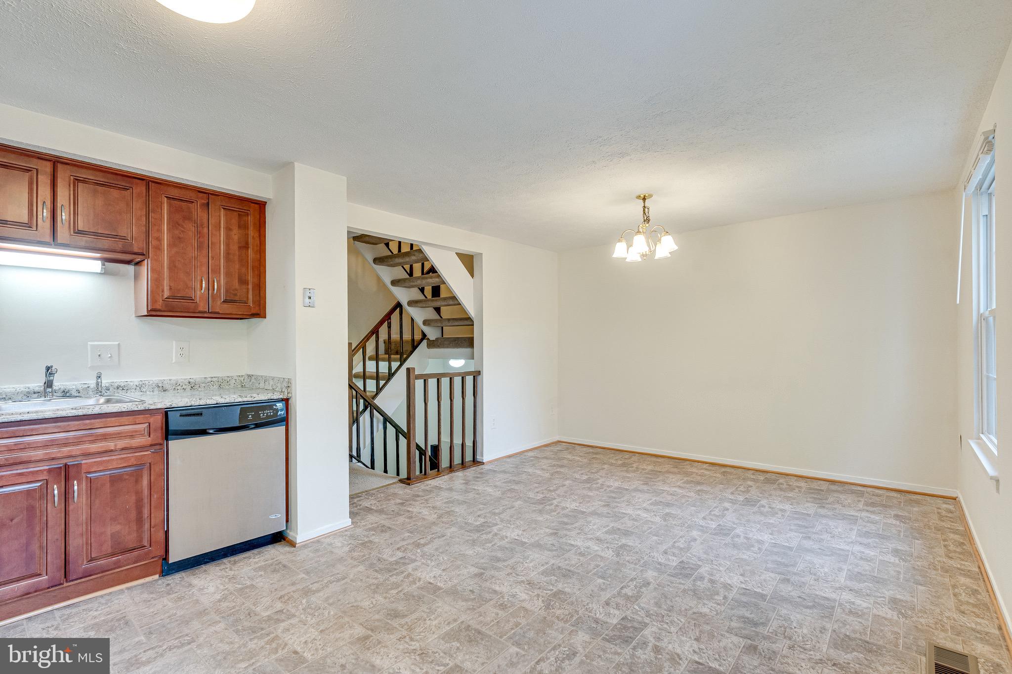6518 Alexis Lane Springfield, VA 22152 - Photo 15 of 44 a very nice looking room with a view of kitchen