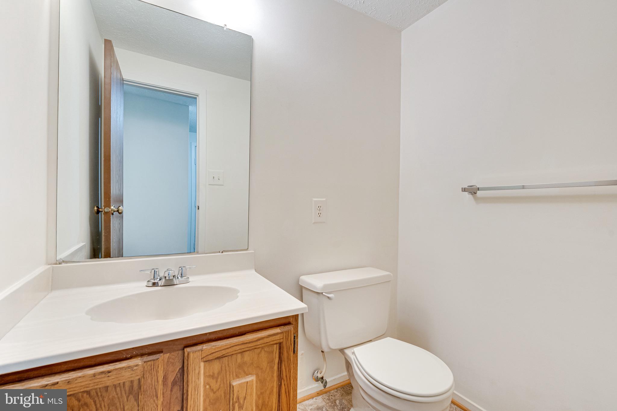 6518 Alexis Lane Springfield, VA 22152 - Photo 17 of 44 a bathroom with a sink and a toilet