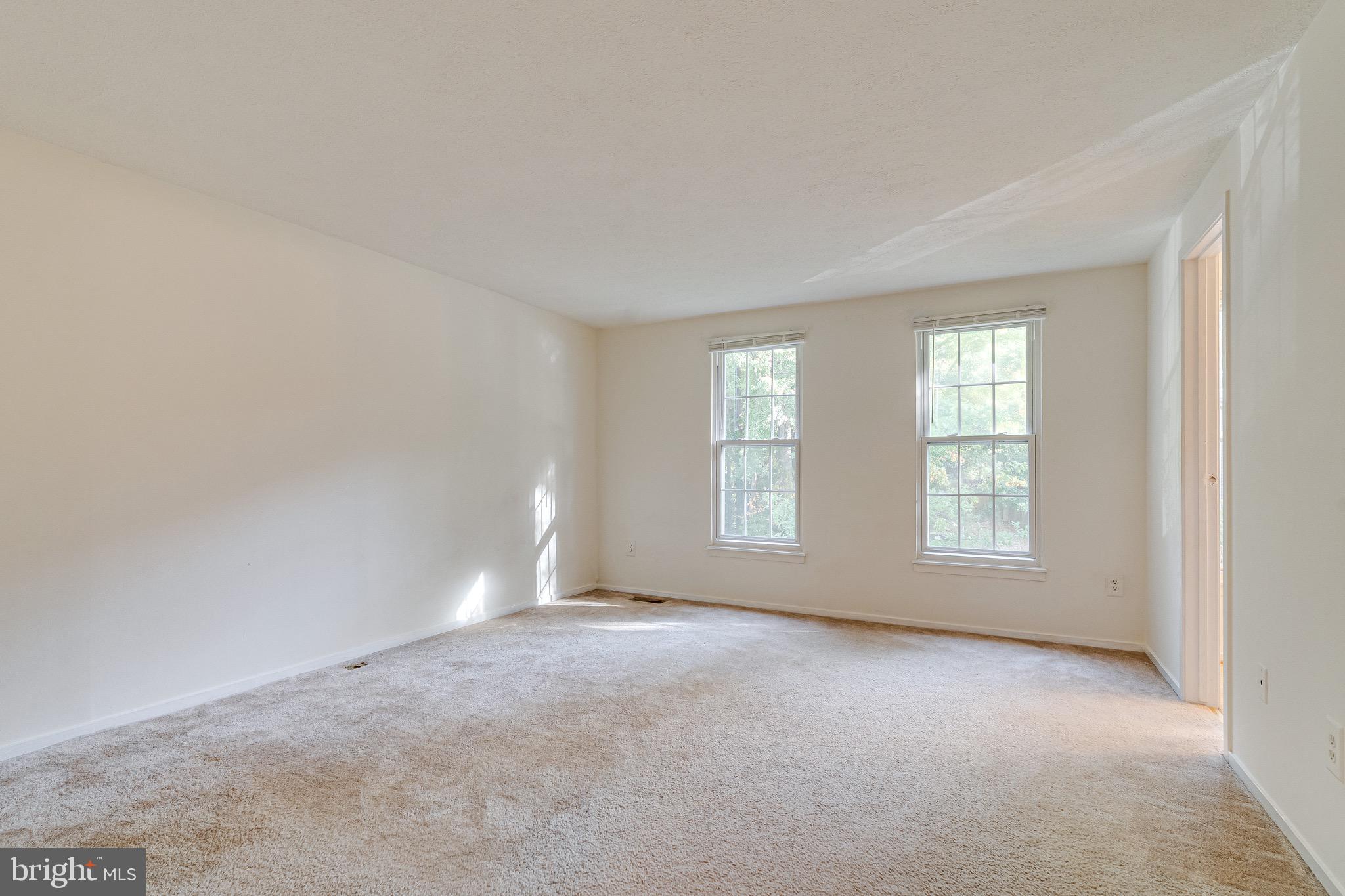 6518 Alexis Lane Springfield, VA 22152 - Photo 18 of 44 a view of an empty room with a window
