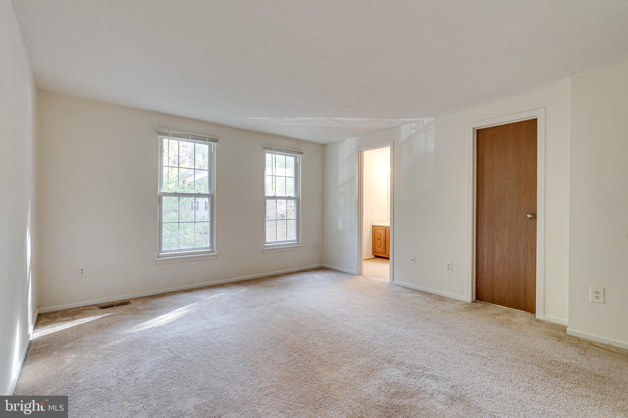 6518 Alexis Lane Springfield, VA 22152 - Photo 19 of 44 an empty room with windows