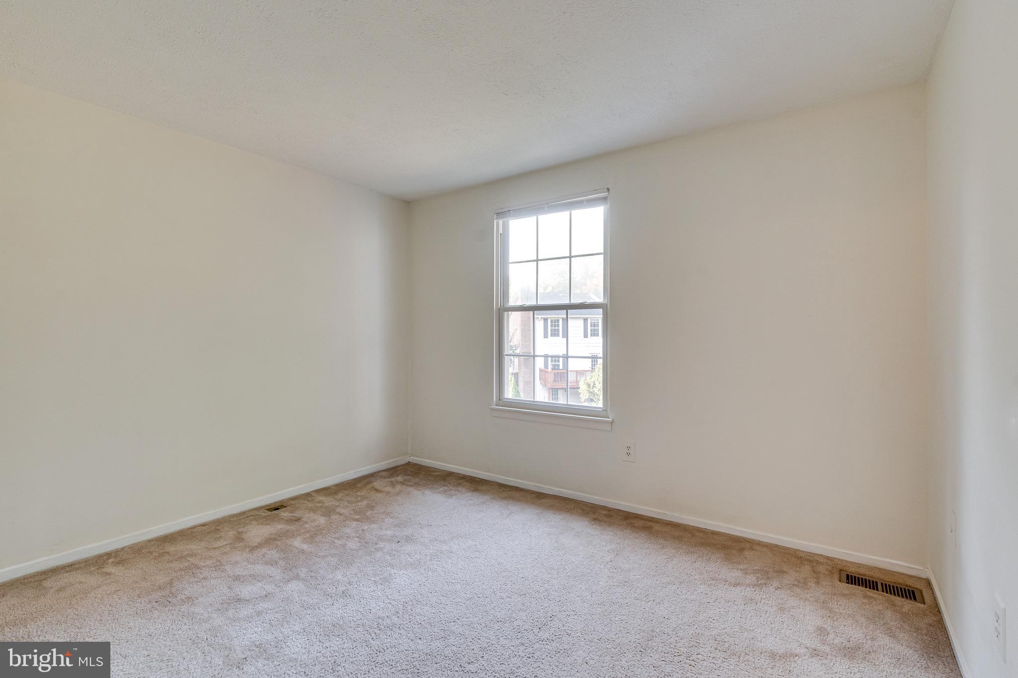 6518 Alexis Lane Springfield, VA 22152 - Photo 24 of 44 an empty room with a window