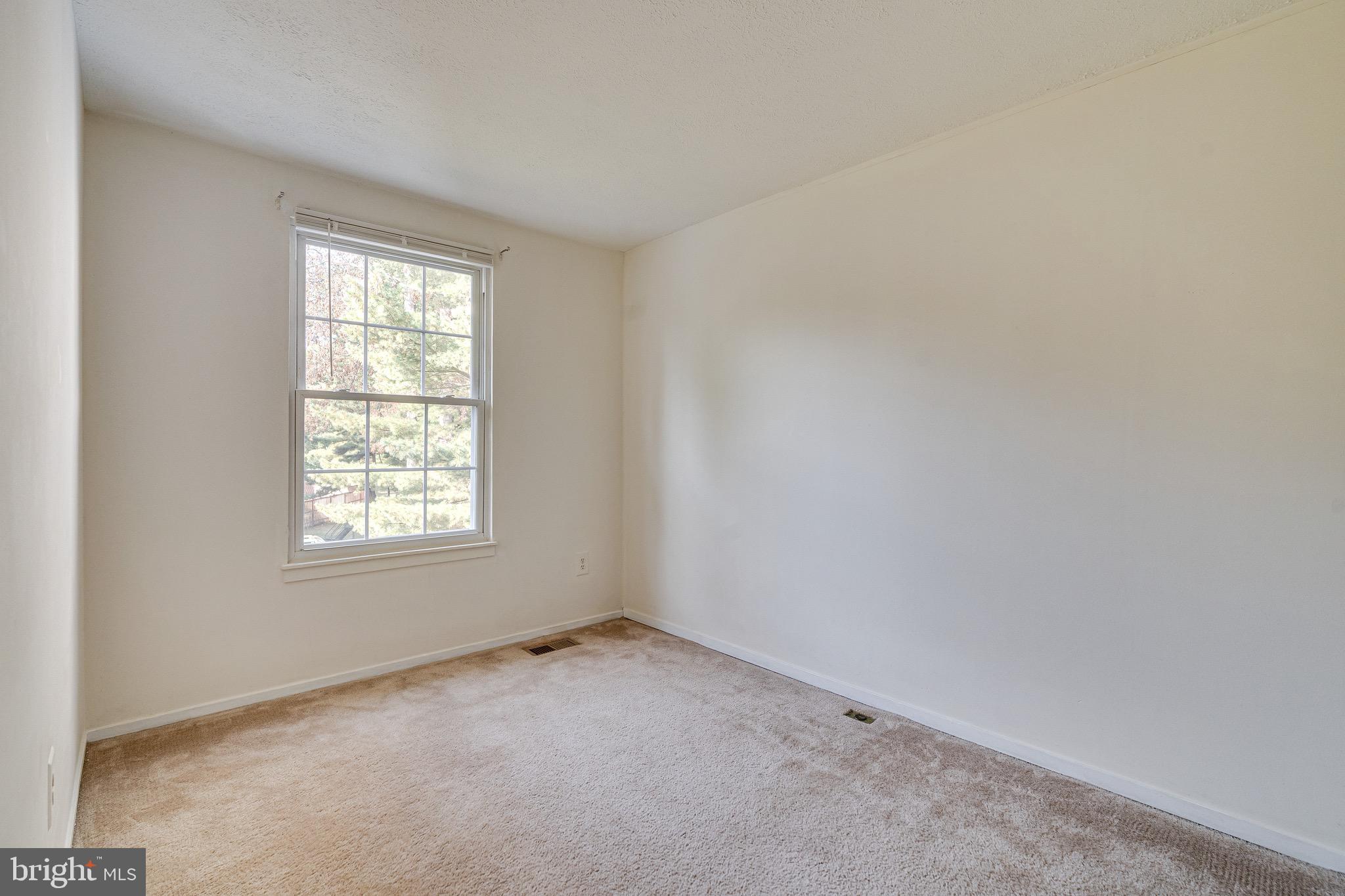 6518 Alexis Lane Springfield, VA 22152 - Photo 26 of 44 an empty room with a window