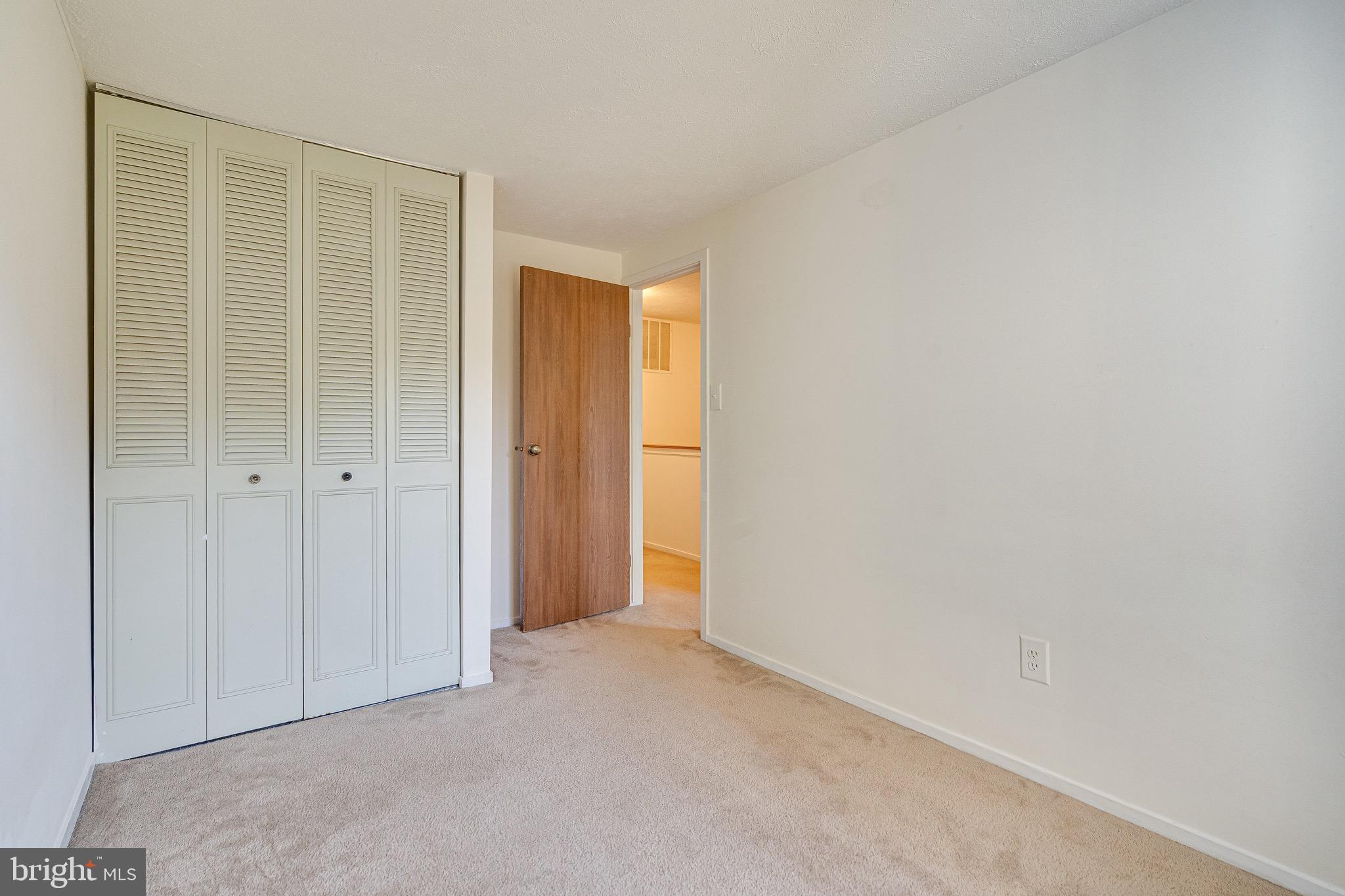 6518 Alexis Lane Springfield, VA 22152 - Photo 27 of 44 an empty room with windows