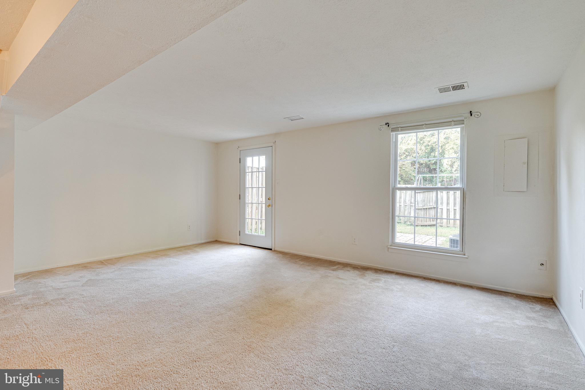 6518 Alexis Lane Springfield, VA 22152 - Photo 29 of 44 an empty room with windows