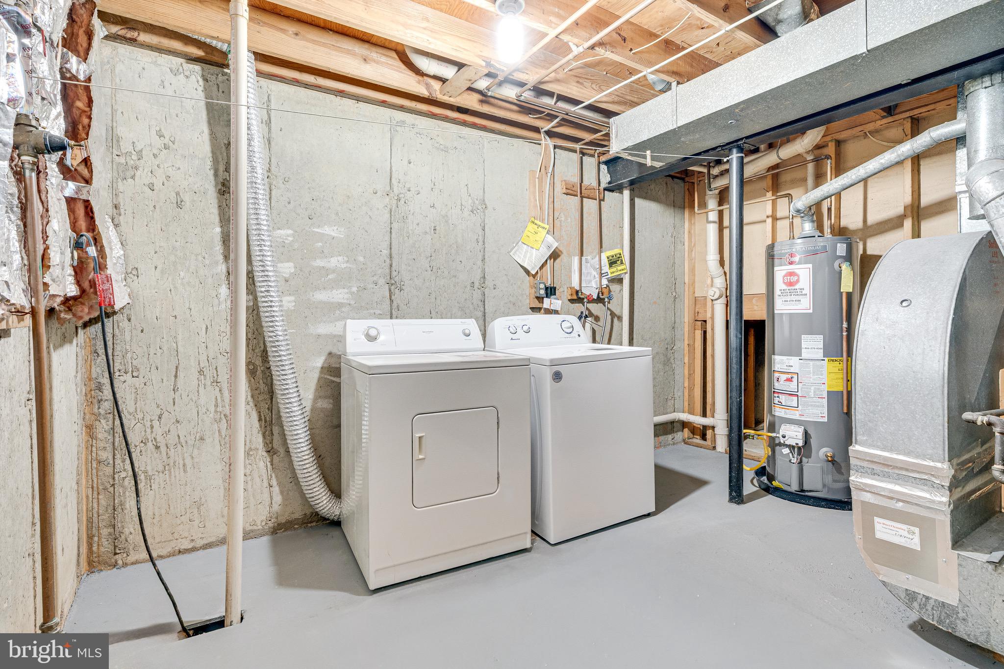 6518 Alexis Lane Springfield, VA 22152 - Photo 34 of 44 a utility room with dryer and washer