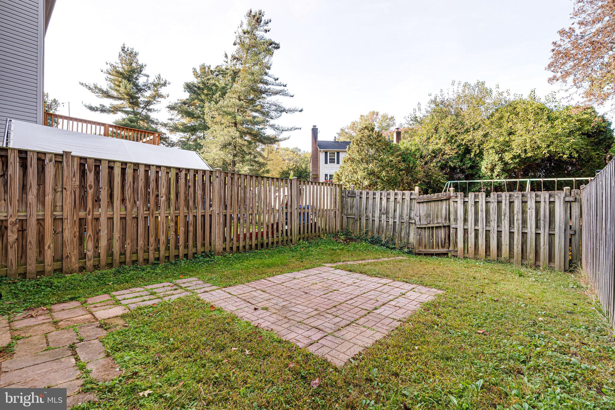 6518 Alexis Lane Springfield, VA 22152 - Photo 36 of 44 a view of a backyard with a trees