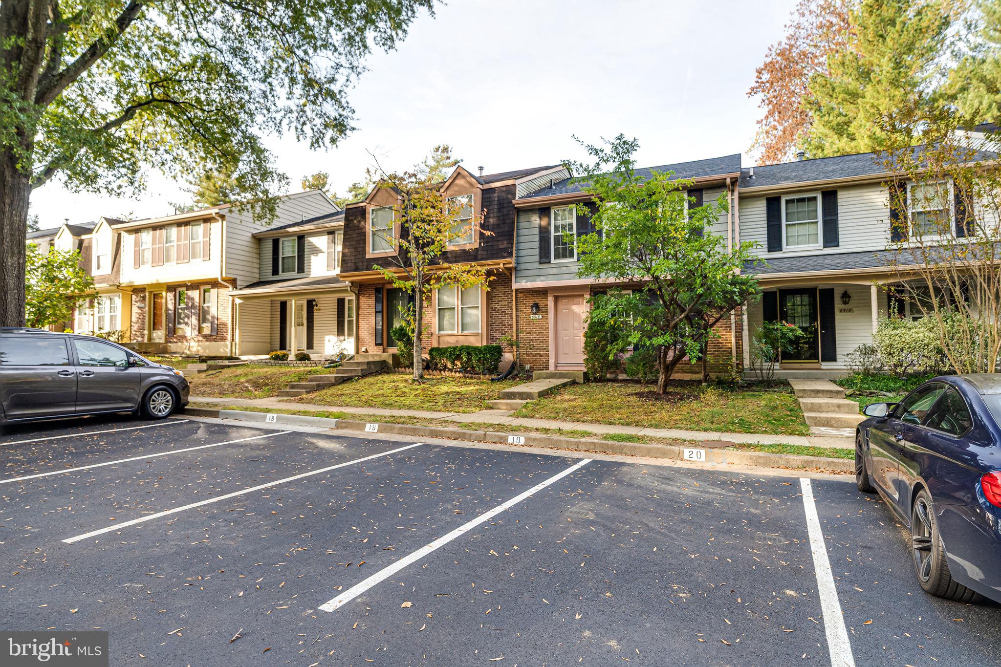 6518 Alexis Lane Springfield, VA 22152 - Photo 4 of 44 a view of a parked cars in front of a building