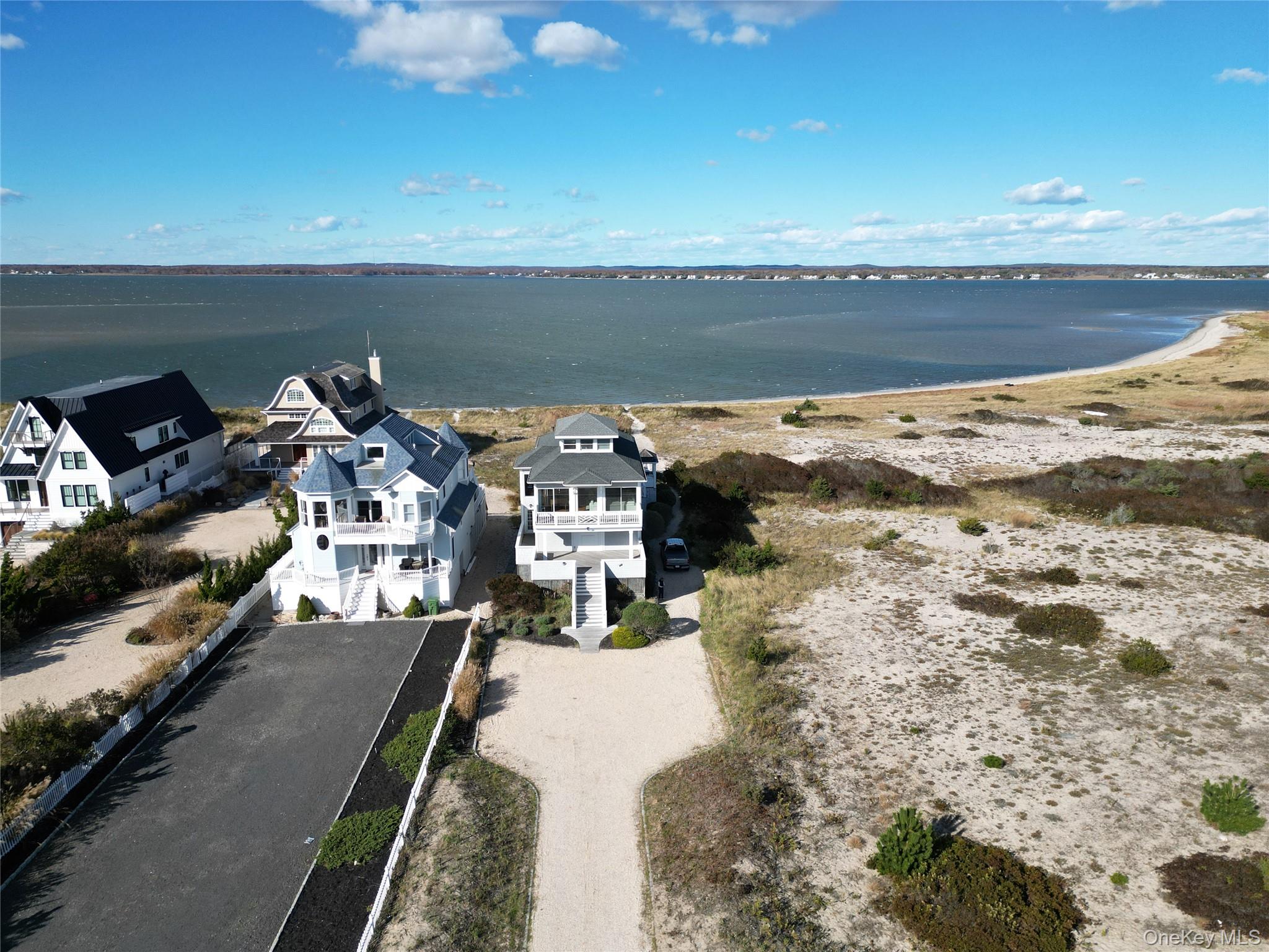 750 Dune Road West Hampton Dunes, NY 11978 - Photo 1 of 49 View of subject property with a large body of water