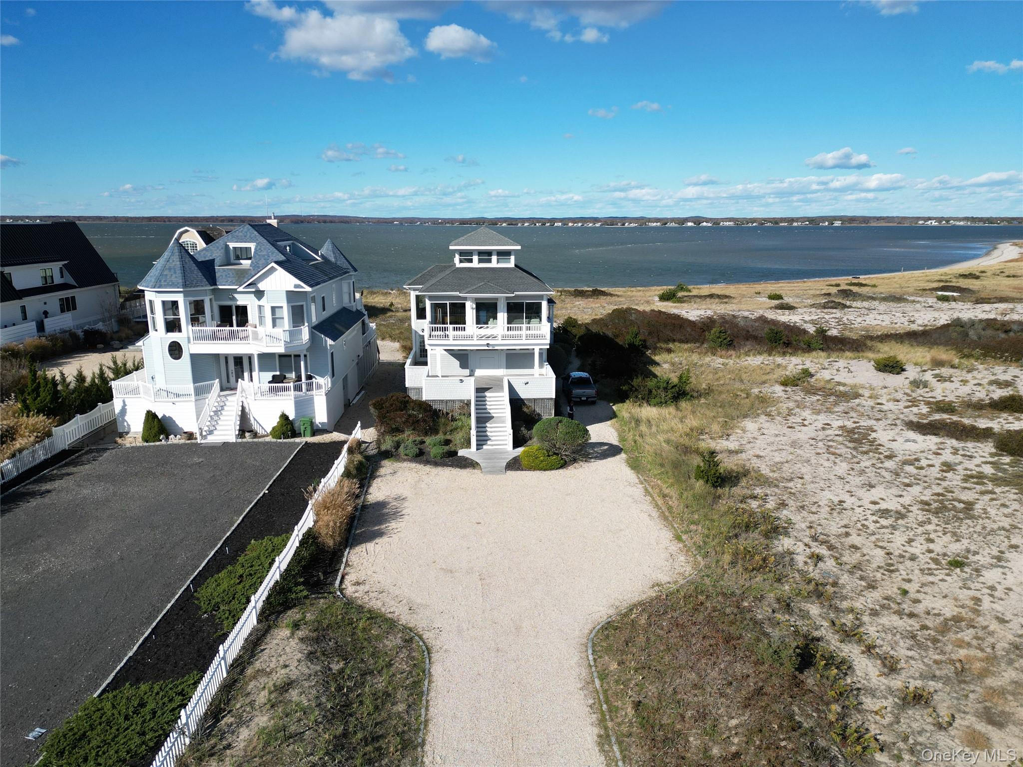 750 Dune Road West Hampton Dunes, NY 11978 - Photo 4 of 49 View of subject property with a large body of water
