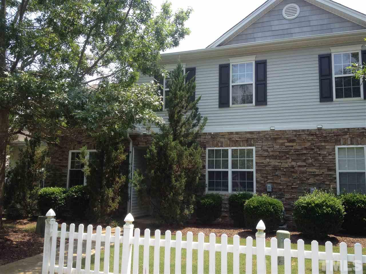 a front view of house with yard