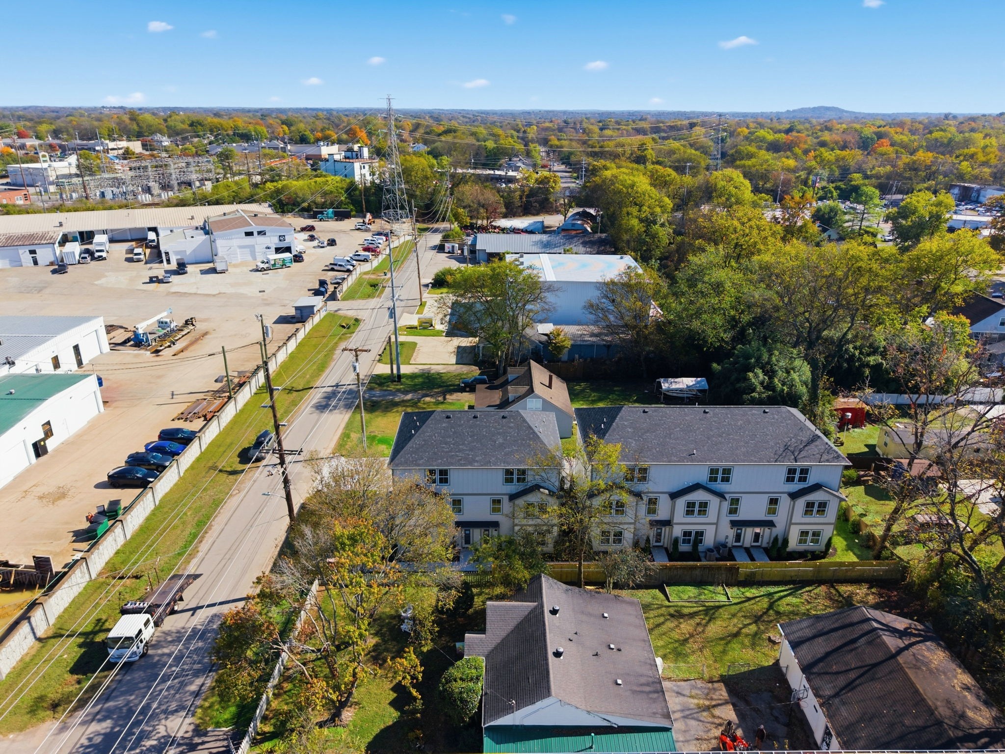 1020 West Kirkland Avenue, Unit C Nashville, TN 37216 - Photo 21 of 23 an aerial view of a house with a swimming pool yard and mountain view in back