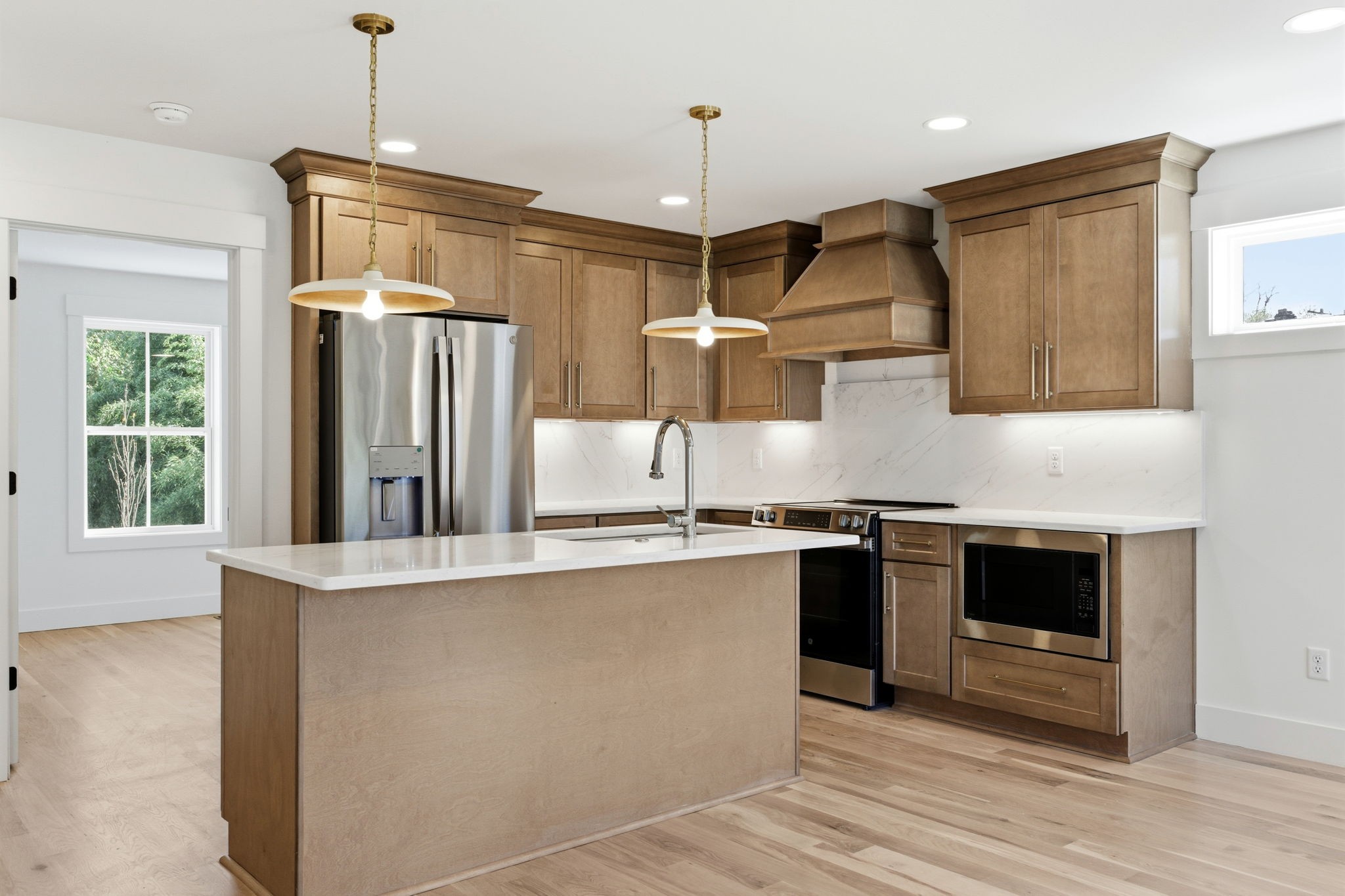 1020 West Kirkland Avenue, Unit C Nashville, TN 37216 - Photo 3 of 23 a kitchen with stainless steel appliances granite countertop a refrigerator a sink and a stove