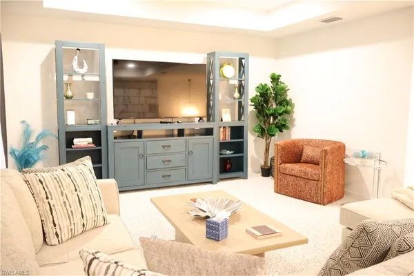 a bed room with a bed and a couch