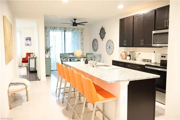 a bathroom with a sink double vanity granite and a mirror