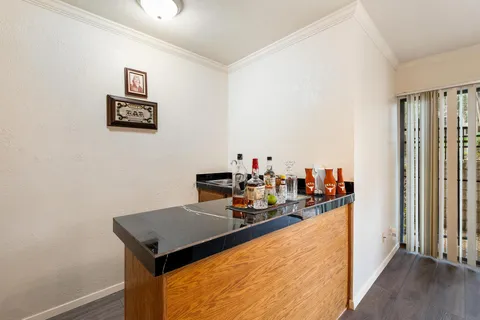a bathroom with a toilet a sink and a shower