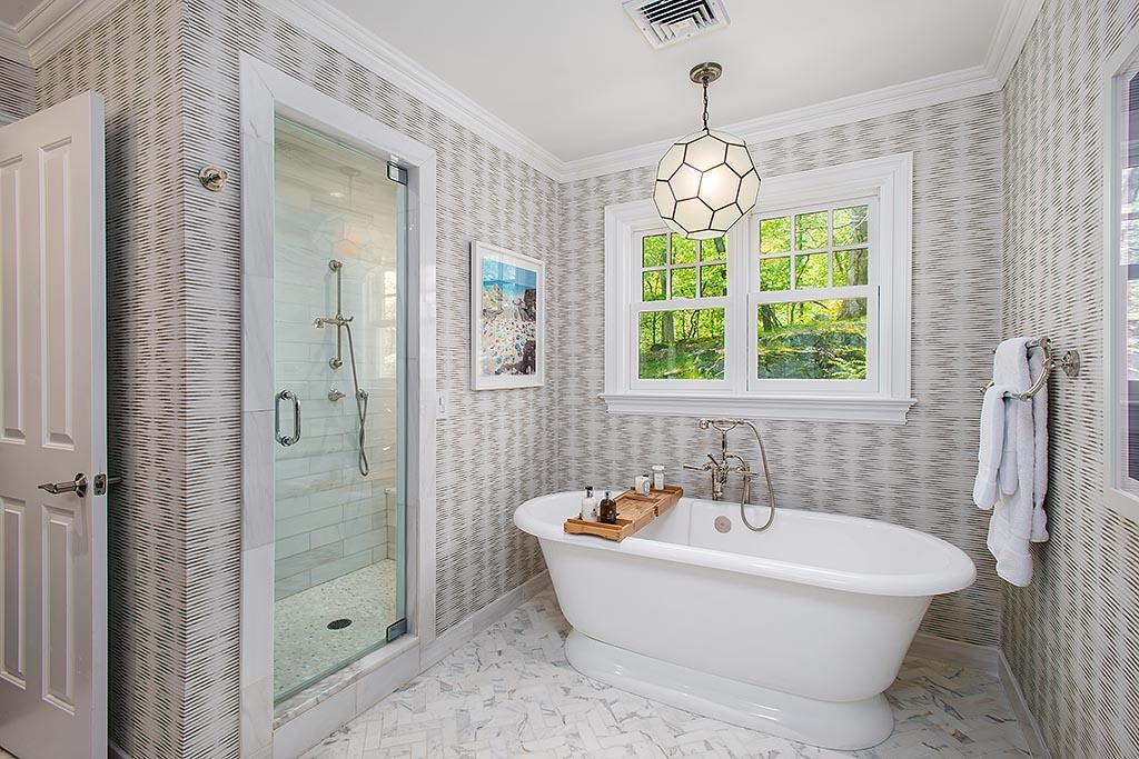 2 Carriage Road Cos Cob, CT 06807 - Photo 13 of 25 a white bath tub sitting next to a bathroom sink