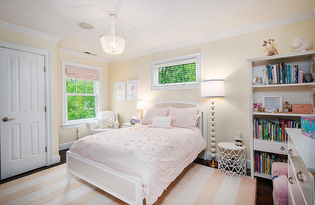 2 Carriage Road Cos Cob, CT 06807 - Photo 14 of 25 a bedroom with a bed and a book shelf