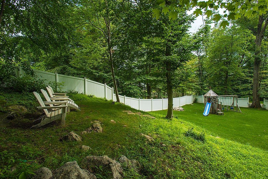 2 Carriage Road Cos Cob, CT 06807 - Photo 24 of 25 a garden with trees in the background