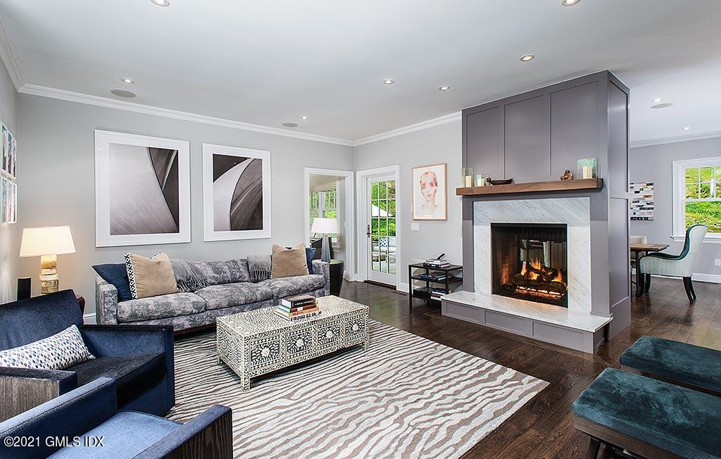 2 Carriage Road Cos Cob, CT 06807 - Photo 3 of 25 a living room with furniture and a fireplace