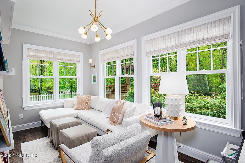 2 Carriage Road Cos Cob, CT 06807 - Photo 10 of 25 a living room with furniture and a large window