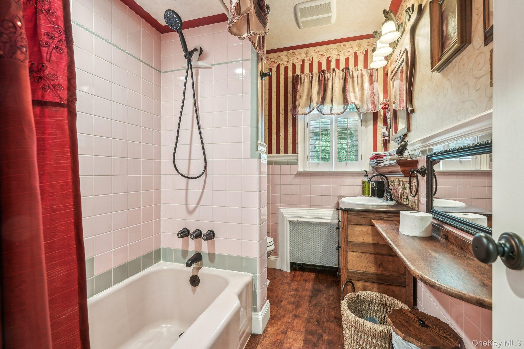 55 Buckberg Road Tomkins Cove, NY 10986 - Photo 12 of 46 a bathroom with a bath tub a sink and a window