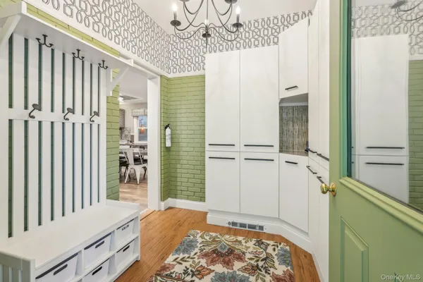 a view of bedroom with wooden floor