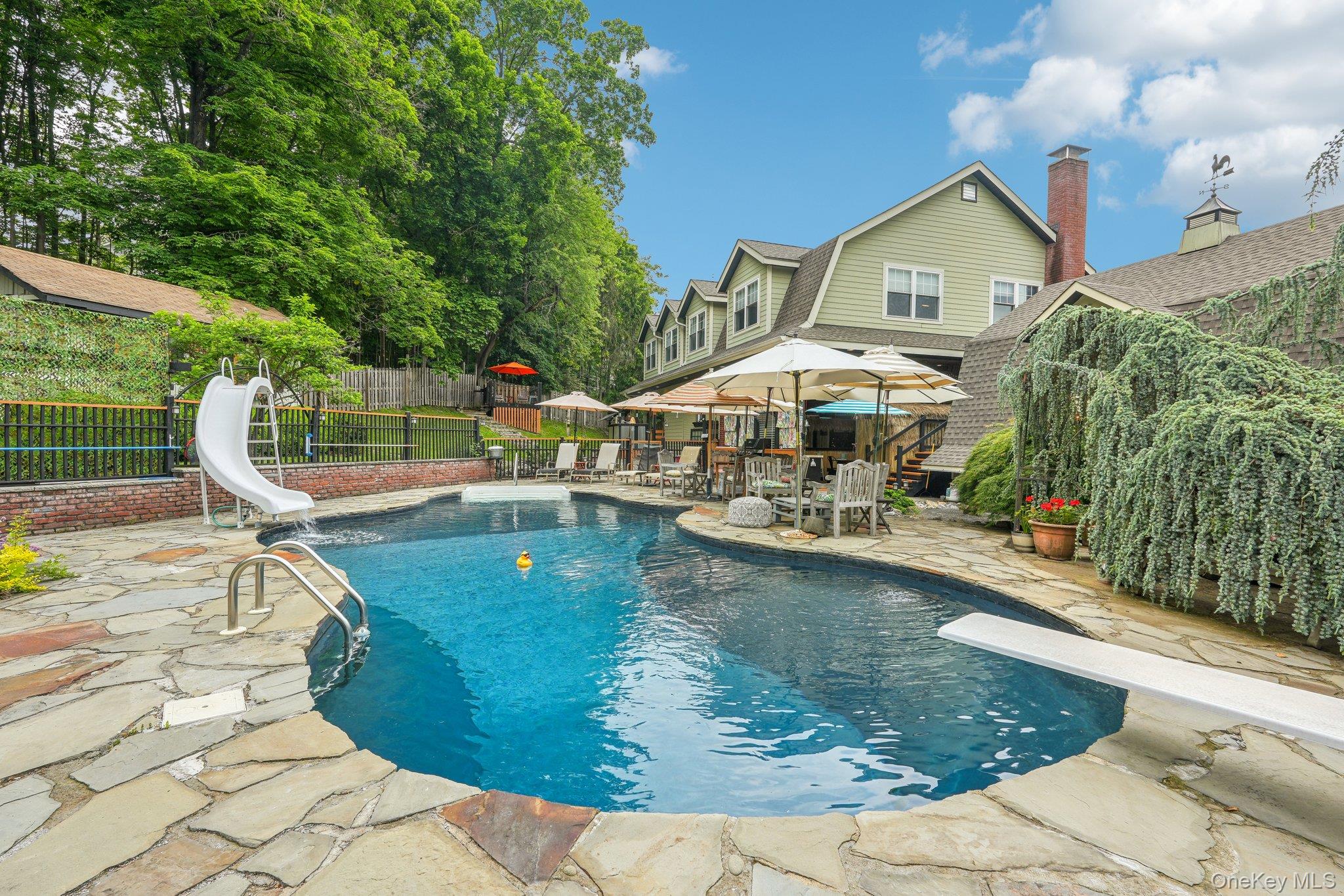 55 Buckberg Road Tomkins Cove, NY 10986 - Photo 2 of 46 a view of a house with pool