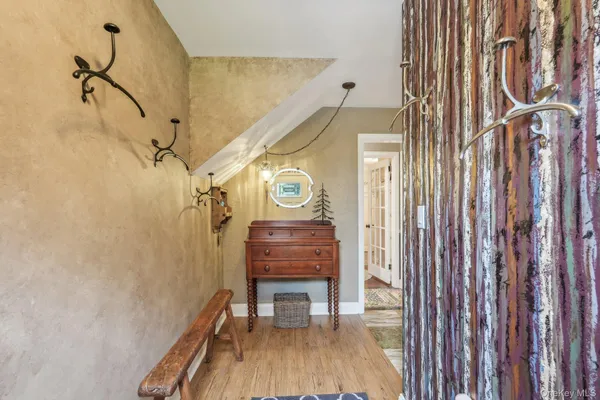 a view of a room with racks on the wall