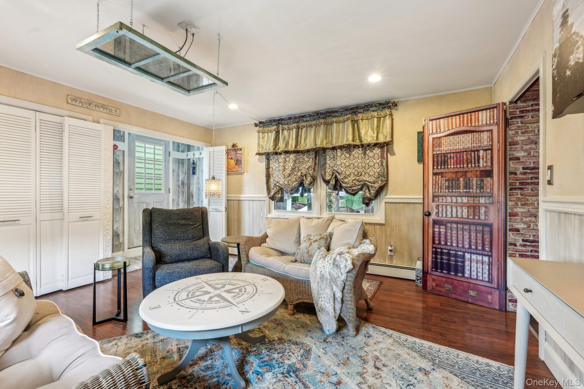 55 Buckberg Road Tomkins Cove, NY 10986 - Photo 31 of 46 a living room with furniture a rug and a large window