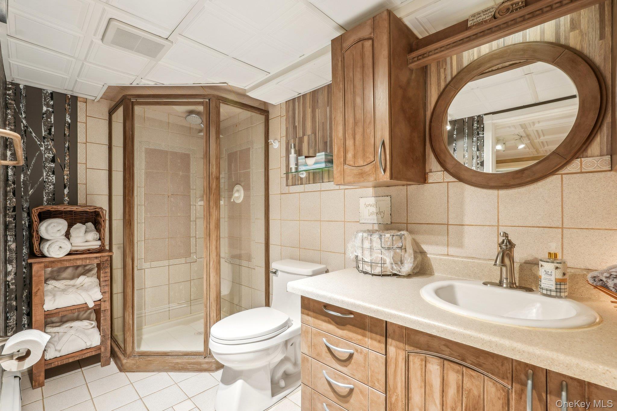 55 Buckberg Road Tomkins Cove, NY 10986 - Photo 34 of 46 a bathroom with a sink a toilet and shower