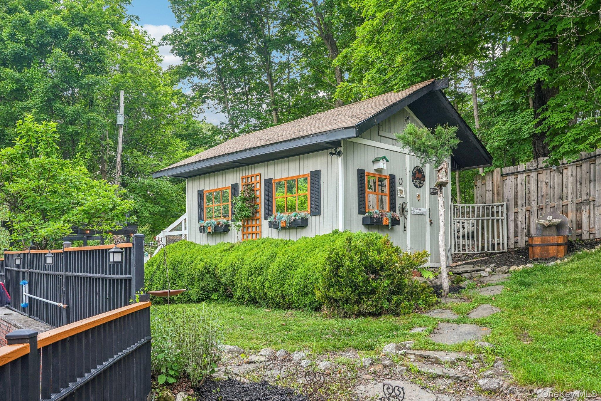 55 Buckberg Road Tomkins Cove, NY 10986 - Photo 38 of 46 a view of a house with a yard and plants