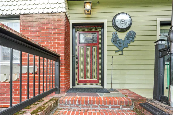 a view of a swimming pool with chairs