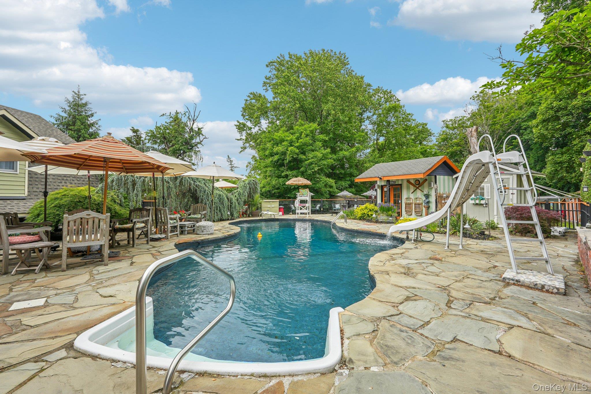 55 Buckberg Road Tomkins Cove, NY 10986 - Photo 45 of 46 a view of a swimming pool with chairs