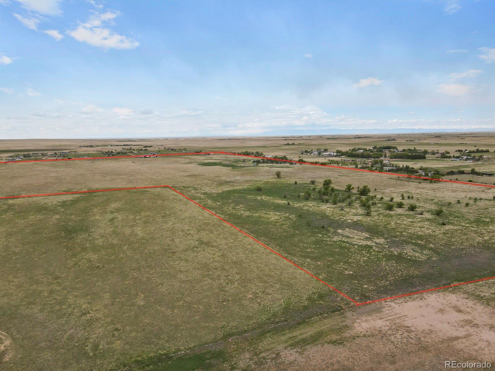 1 South E Ellicott Road Calhan, CO 80808 - Photo 10 of 13 a view of an ocean and beach