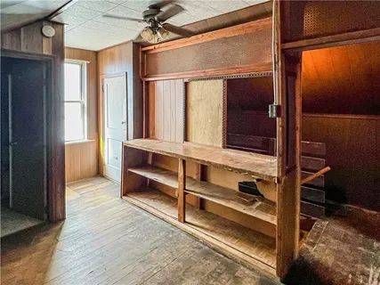 a view of front door and bedroom