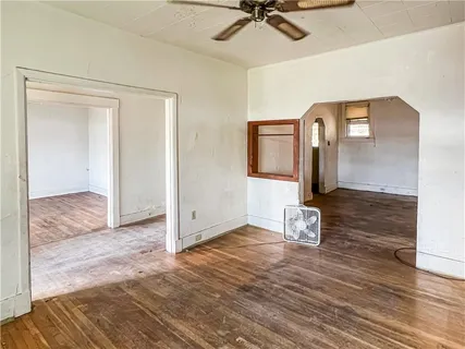 a view of a livingroom with wooden floor