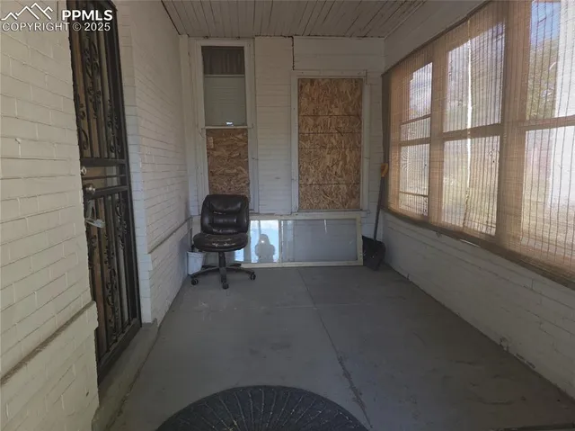 a view of room with window and stairs