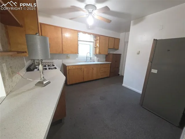 a bathroom with a double vanity sink mirror and shower