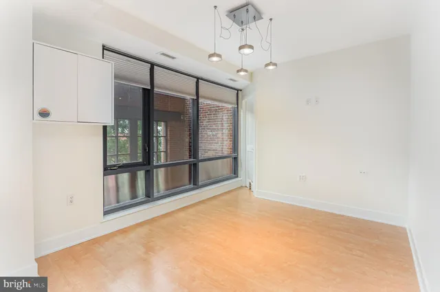 en empty room with windows