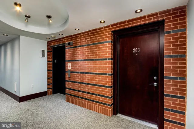 a view of a hallway with closet