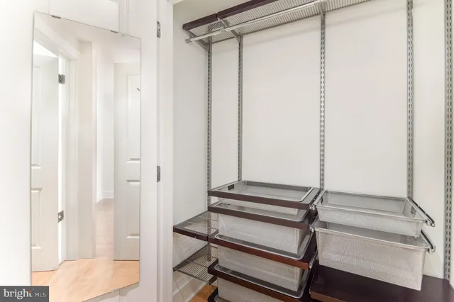 a view of room with wooden floor