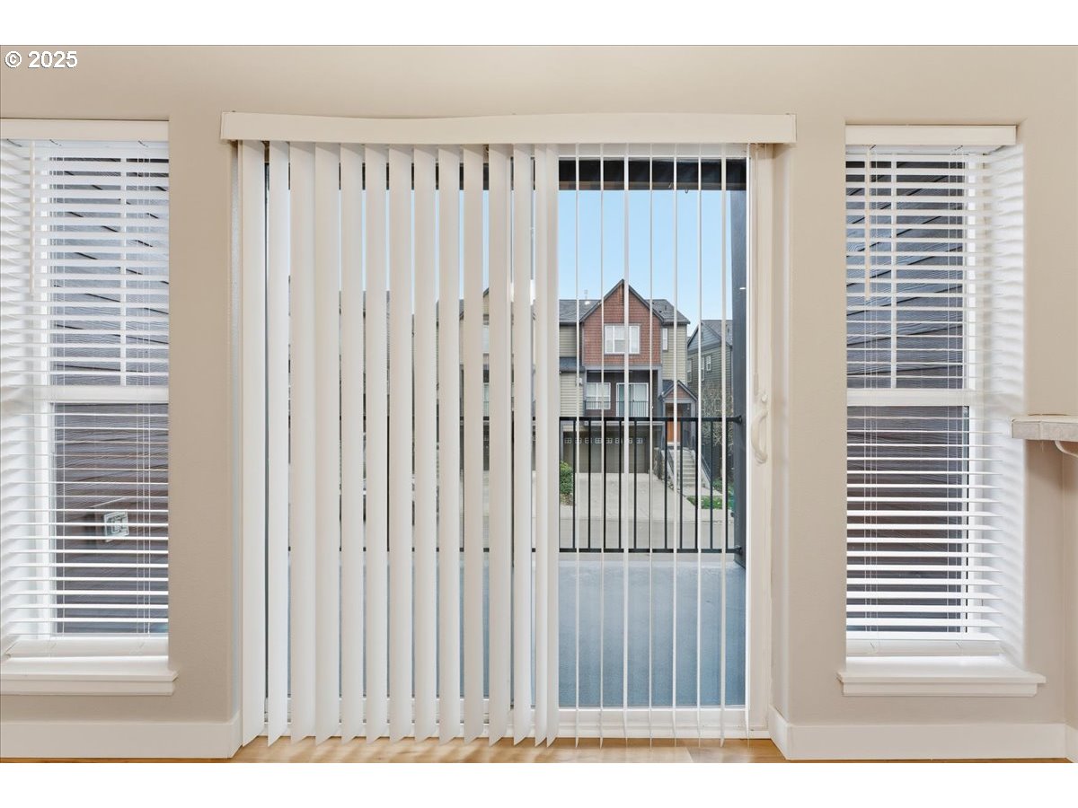 10835 Southwest Huntington Avenue Portland, OR 97223 - Photo 13 of 40 a view of a balcony with wooden floor