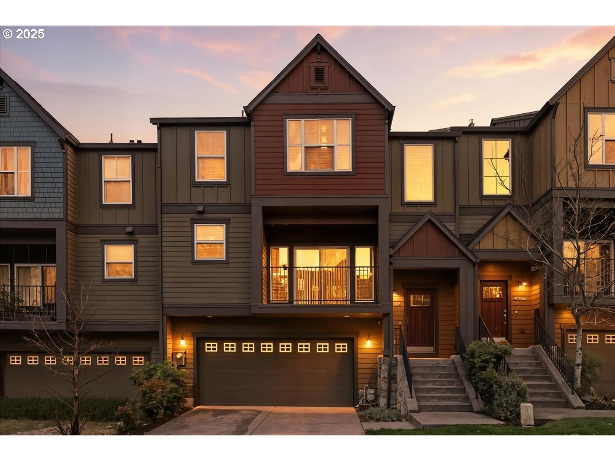 10835 Southwest Huntington Avenue Portland, OR 97223 - Photo 2 of 40 a front view of a house with a yard