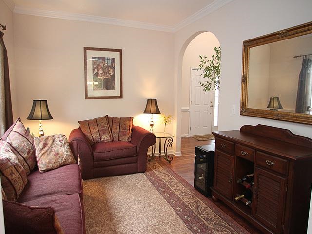 164 Mickleson Ridge Drive Raleigh, NC 27603 - Photo 11 of 25 a living room with furniture and a mirror