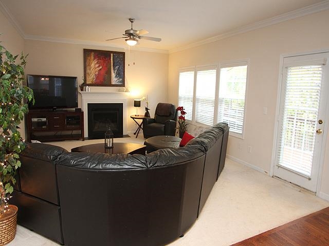 164 Mickleson Ridge Drive Raleigh, NC 27603 - Photo 9 of 25 a living room with furniture and a fireplace